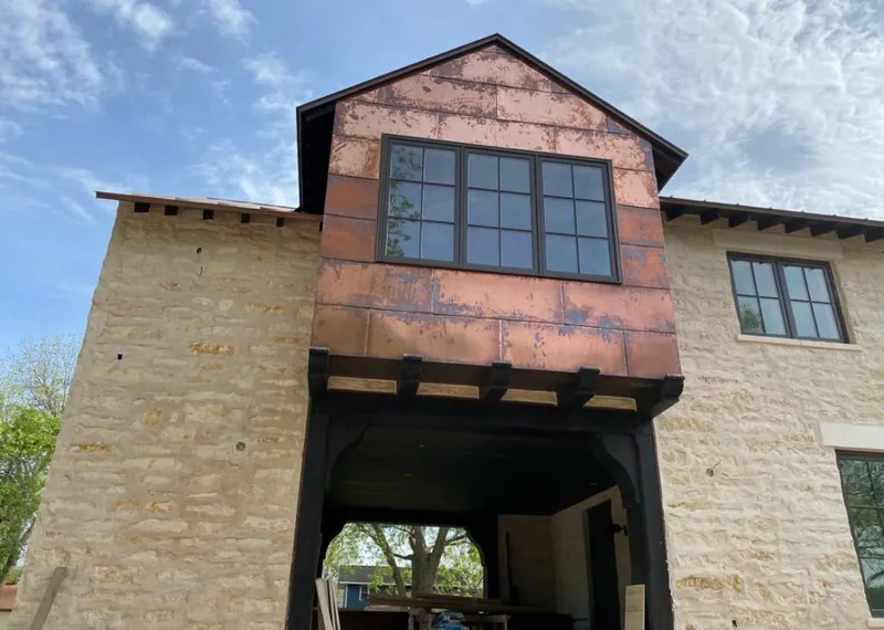 Copper metal panel facade on a stone building for Metal Roof Coating in Westchester