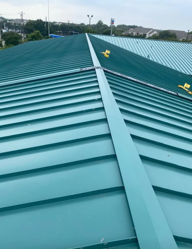 Green commercial metal roof ridge and valley for Metal Roof Repair in Westchester
